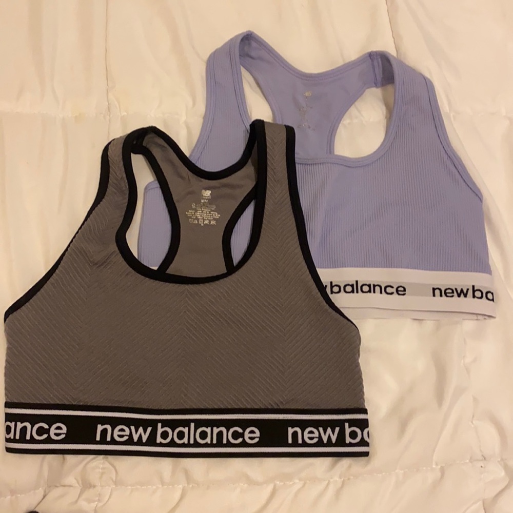 Two purple sports bras
